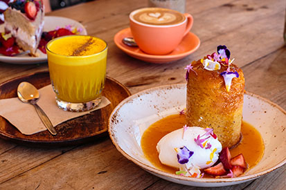 Tumeric Latte, Coffee & Delicious cake from Belle Central