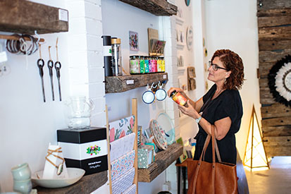 Lady looking at products in a shop