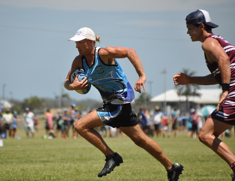 Ballina U18 touch football player makes a break