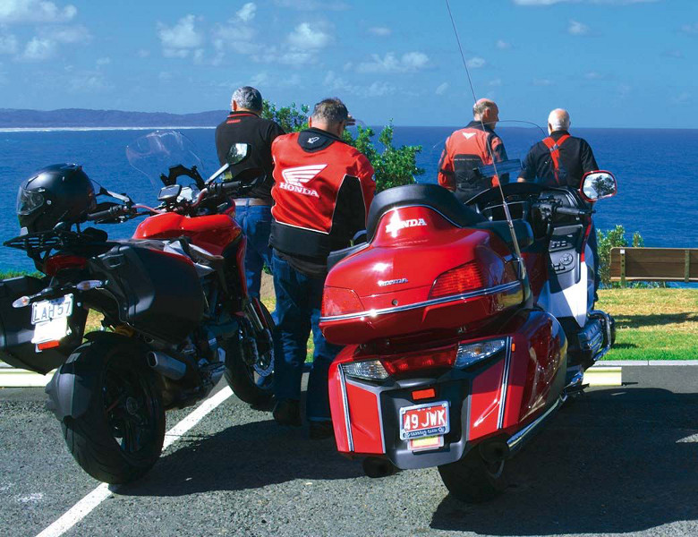 Motorcycles on the coast overlooking beach