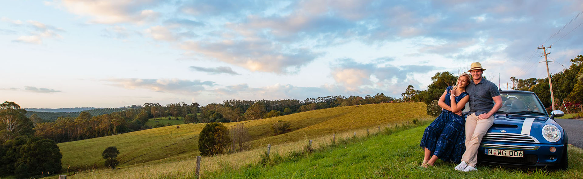 Couple sitting on top of Hinterland 