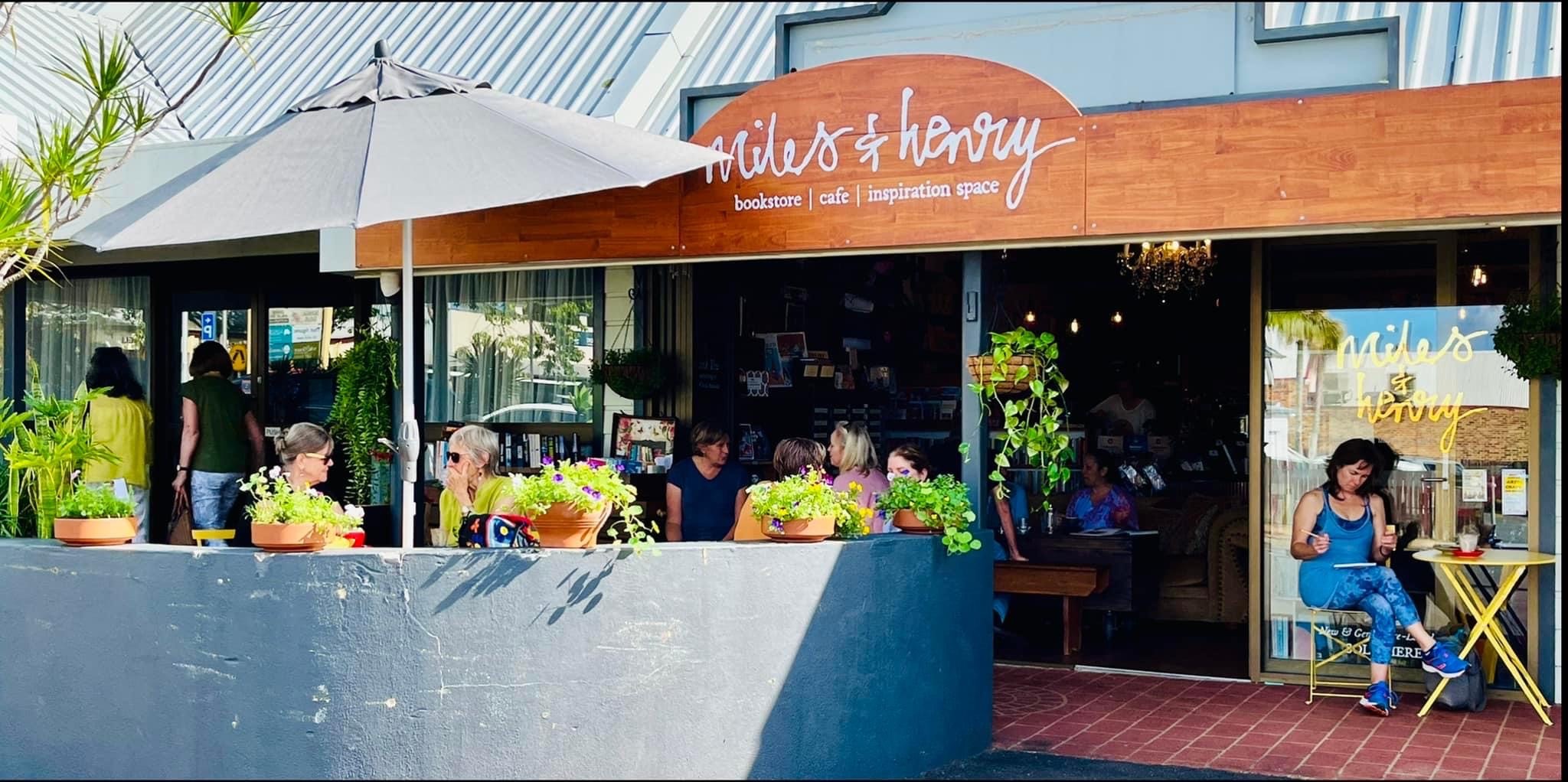 Miles and Henry front of cafe