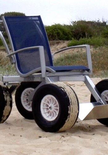 Accessible Attractions Beach Wheelchair Soft Background beach wheelchair on sand