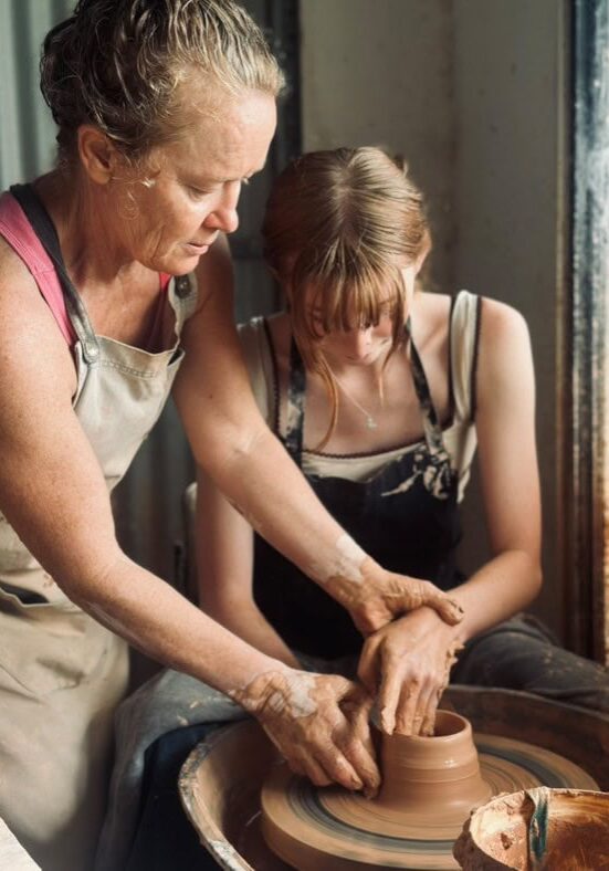 Brooke Clunie Clay Workshop – Hands-On Pottery in Northern NSW Potter Brooke Clunie guiding a participant during a hands-on clay workshop in the Ballina Hinterland, Northern NSW
