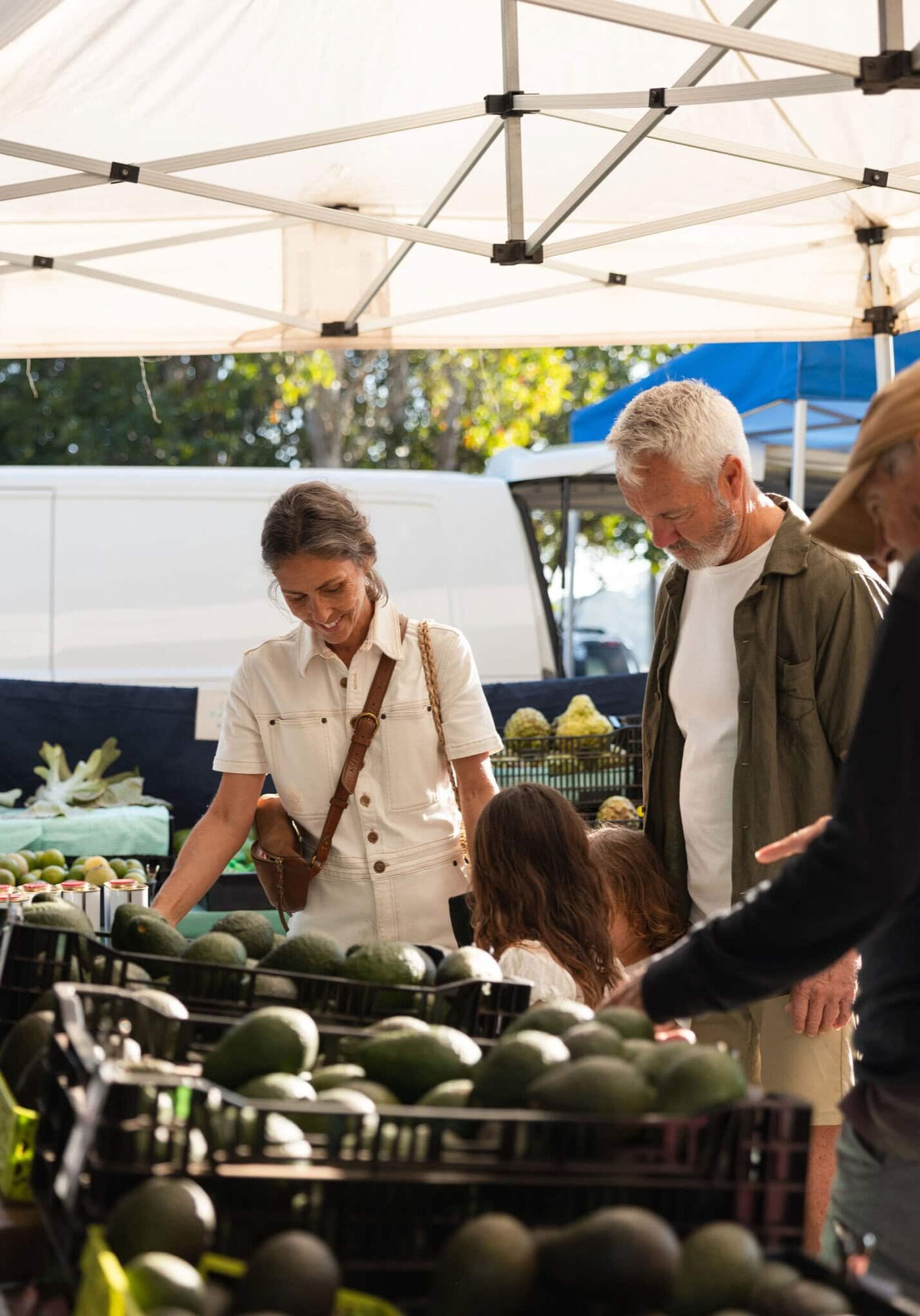 Farmers Market Ballina Coast Couple looking at avocados at local ballina market